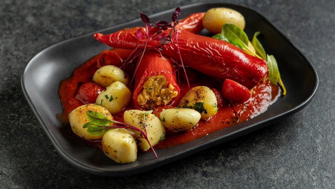 Stuffed paprika with citrusy tomato sauce