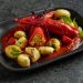 Stuffed paprika with citrusy tomato sauce